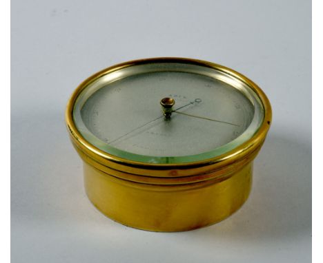 A late 19c aneroid barometer  by Adie of 395 The Strand, having a 4.5in diam. silvered dial, the scale from 23 to 31in of mer