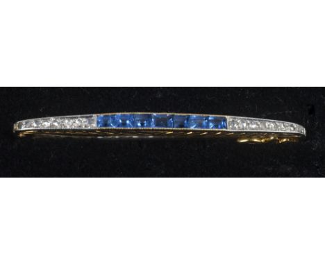 A yellow gold diamond and sapphire set bar brooch, 1.6in w.