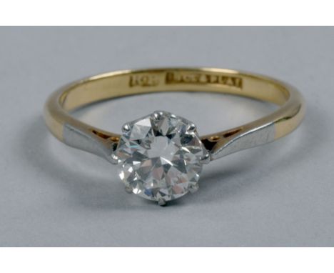 An 18ct gold platinum set diamond solitaire ring, approx 1carat.