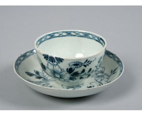 A Liverpool blue and white teabowl and saucer painted with the 'Bird on a Branch' pattern, saucer 4.75in diam.