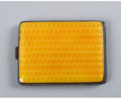 An early 20c silver and yellow enamel panelled paper matchbox, 2.25in w.