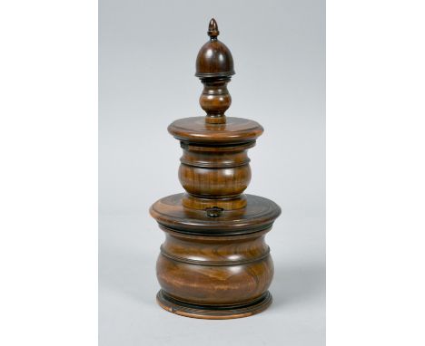 A 19c turned walnut coffee mill of stepped bulbous ring turned design with an acorn finial, 10.5in h.
