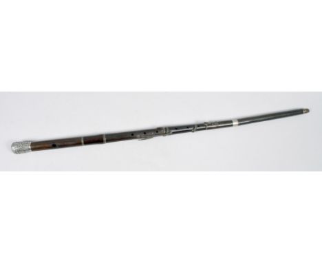 An Edwardian flute walking stick with silver embossed and chased knop handle, 36in l.