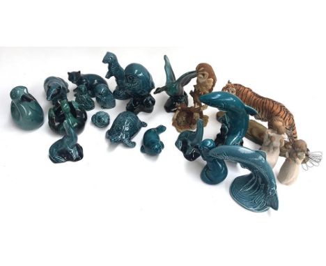 A collection of 16 Poole Pottery figures of animals, including trout, otters, seals, badgers, owls, ducks, etc; together with