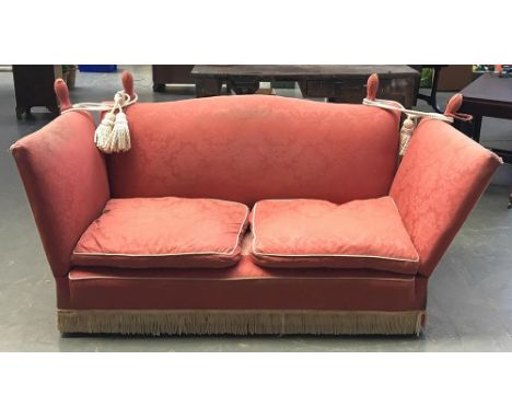 A knoll sofa, upholstered in pink, approximately 195cm wide with the ends up 