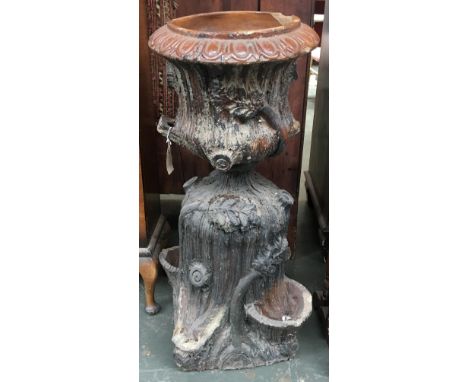 An unusual ceramic garden urn/planter, in the form of a tree trunk 