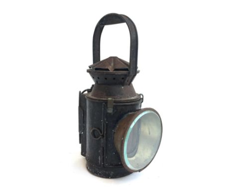 Railway interest: a vintage guard's lamp with three coloured filters 