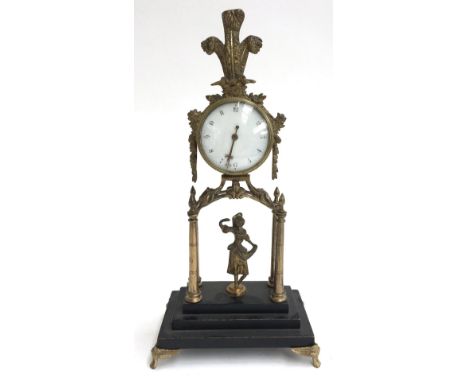 A gilt metal mantel clock, three feather crest over white dial with Arabic numberals, supported on four columns with pointed 