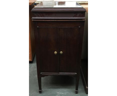 A mahogany standing gramophone cupboard (converted), together with a 19th century bedside cabinet with commode drawer 