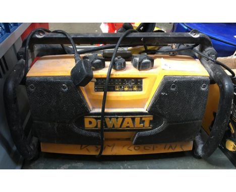 A DeWalt radio, together with a Hawk 500W lamp 