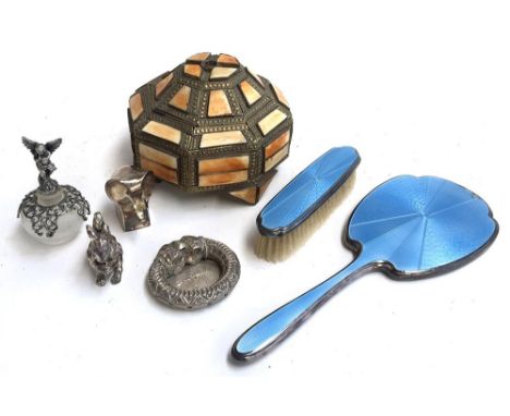A bone inlaid metal octagonal trinket box, an Eastern white metal ashtray, several figures, and an enamelled clothes brush an