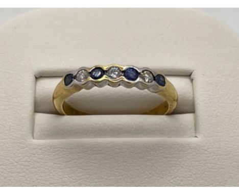 18CT GOLD SAPPHIRE AND DIAMOND HALF ETERNITY RING SET WITH 4 ROUND SAPPHIRES 3 ROUND CUT DIAMONDS APPROX .15CT SIZE N 3.4G