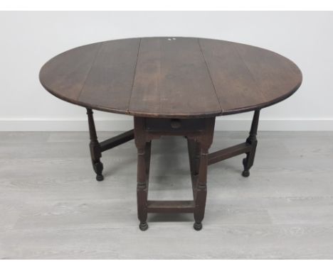 SPILLMAN &amp; CO ST. MATINS LANE LONDON ANTIQUE OAK GATE LEG DINING TABLE WITH CIRCULAR TOP 99CM BY 69CM BY 121CM