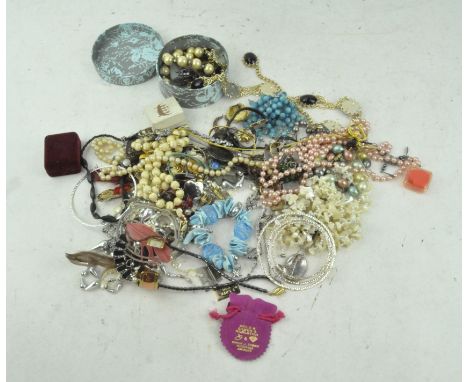 An extensive selection of vintage costume jewellery, necklaces brooches and other pieces