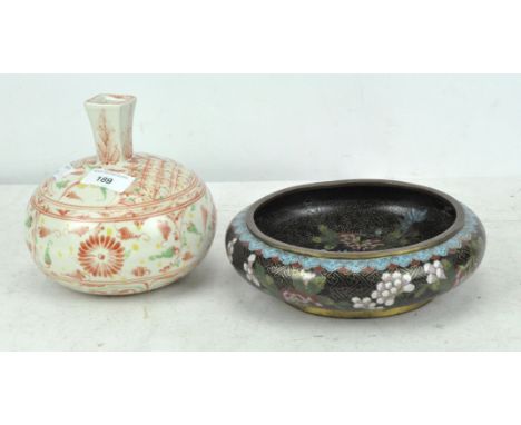 Two pieces of Asian ceramics and metalware, comprising floral cloissonne enamel bowl and a squat vase with green and red deco