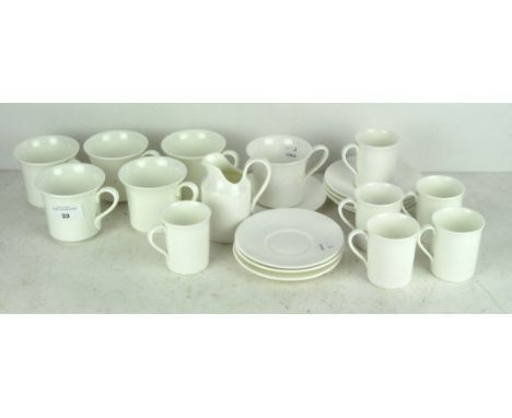 A vintage Royal Doulton coffee set in the 'Palladio' pattern H 5124, comprising tea cups, coffee cups, saucers and a milk jug