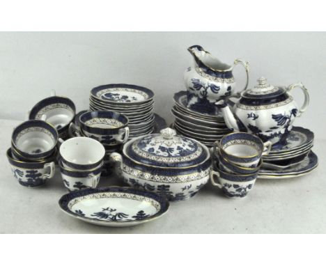 A Royal Doulton tea and part dinner service in the 'Real Old Willow' pattern, comprising cups, saucers, a teapot, tureen, jug