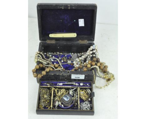 A selection of vintage costume jewellery, to include earrings, rings, necklaces and more, all in a vintage jewellery box