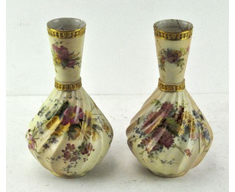 A pair of Royal Worcester blush ivory vases, with conical necks and wrythen body, decorated with spring flowers on an ivory a