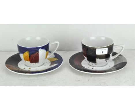 Two contemporary Royal Worcester "Govinder" design tea cups and saucers, depicting cats