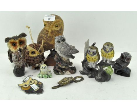 A selection of owl figurines, including ceramic, wooden, brass and glass examples 