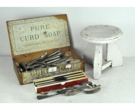 Silver plated flatware, including apostle spoons and a caddy spoon, all contained in a Pure Curd Soap box; together with a fo