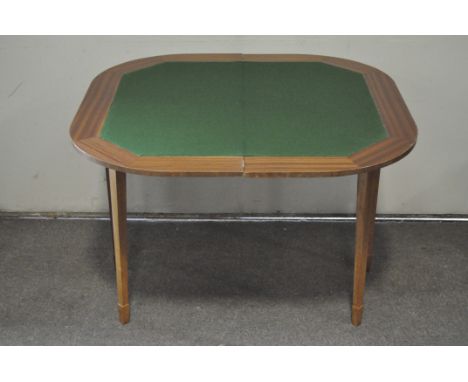 An inlaid mahogany folding card table, raised on tapering supports, 73cm x 95cm x 48cm