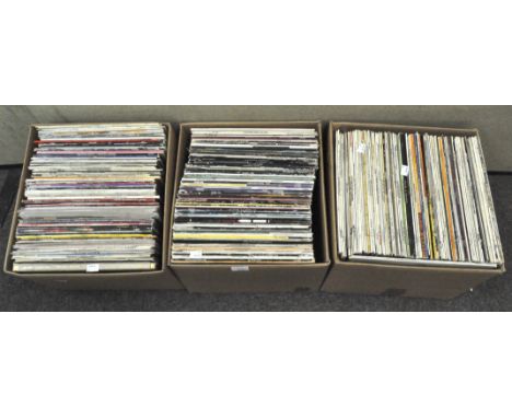 Three boxes of vintage vinyl's, covering a range of styles and artists, including Classic Rock, choral and country festival m