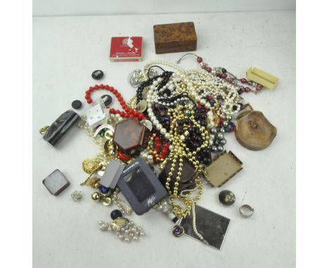 A large selection of vintage costume jewellery, to include clip earrings, necklaces and more