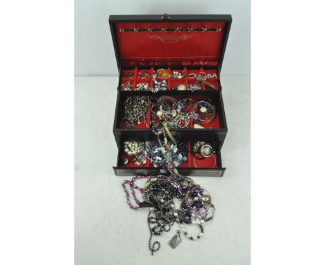 Large selection of vintage costume jewellery, contained in a three tier jewellery box