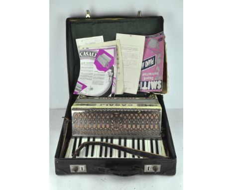 A 20th century Italian 'Casali' accordion, with mother of pearl decoration, in original case