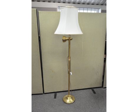 A modern brass standard lamp, with articulated reading light to side, with shade, 178cm high