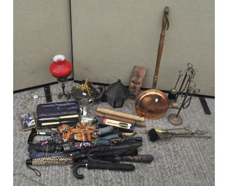 Various items including a copper bed warming pan with wooden handle, together with brass stokers, an oil lamp, red glass vase
