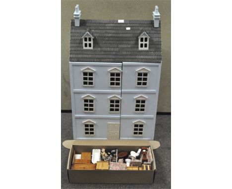A modern wood dolls house and contents including ceramic bathroom suite, wooden furniture, and figures, 88 x 61 x 37.5 cm