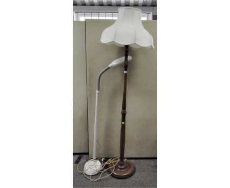 A turned wooden standard lamp; together with National Sunlight lamp, 168 cm (inc shade)