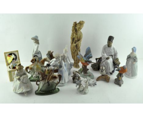 A collection of assorted ceramic figures and others, including birds 