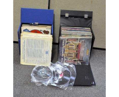 A large selection of vintage vinyl LP records, in two cases