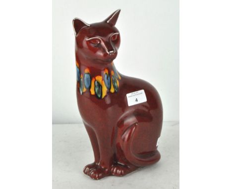 A Poole pottery 'Delphis' red Volcano figure of a seated cat, 29cm high