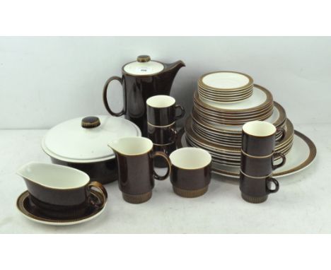 A retro Poole pottery part tea/dinner service, comprising cups, dinner plates, saucers and more