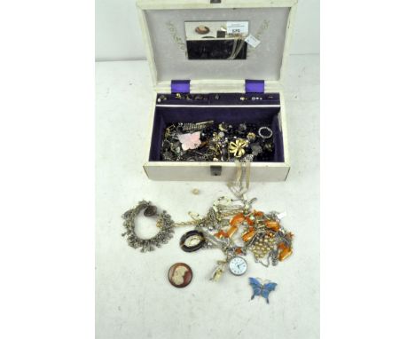 Assorted vintage costume jewellery, including earrings, a cameo brooch and other pieces, in a jewellery box