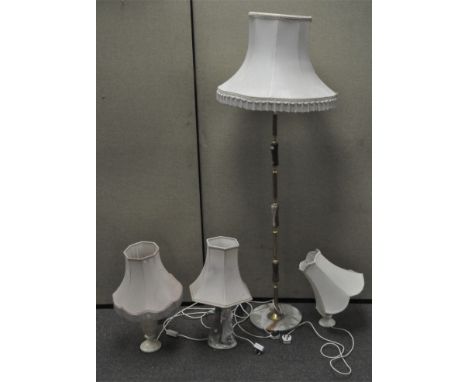 A group of four assorted lamps, comprising three table lamps and one standard lamp, all with shades, the standard lamp 134cm 