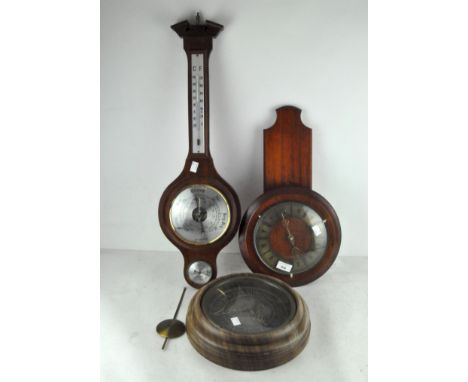 Two contemporary clocks, battery powered, both cased in wood with circular dials and Roman numerals, together with a Weatherm
