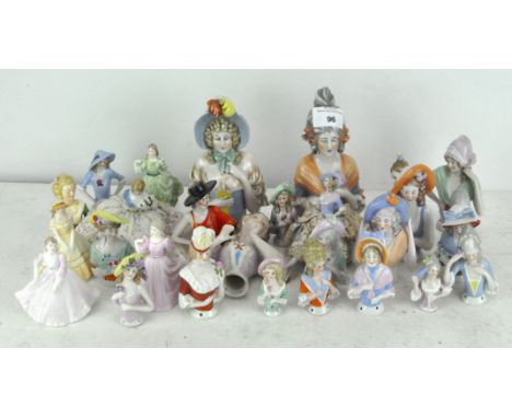 An extensive collection of ceramic Pin cushion heads, of various sizes and designs, all depicting elegant ladies