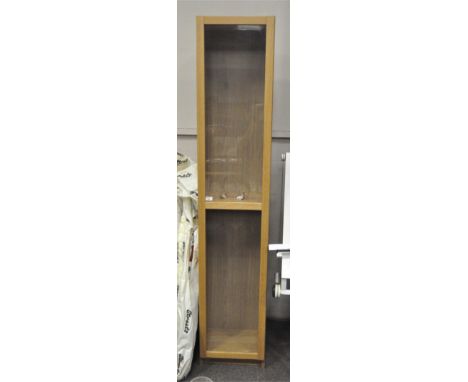 A modern MDF display cabinet with one shelf behind two glazed panels, 202 x 39 x 30 cm