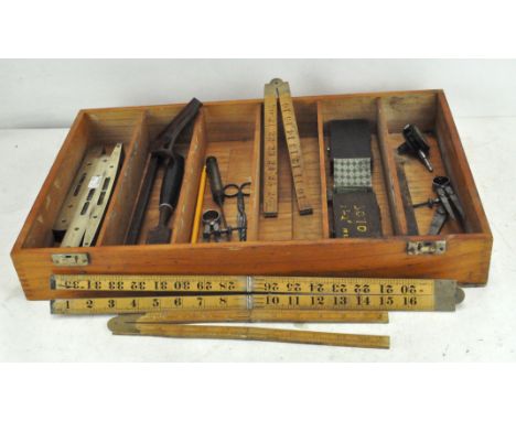 A collection of vintage tools, including three brass mounted spirit levels, one by J Rabone &amp; Sons, folding Rabone boxwoo