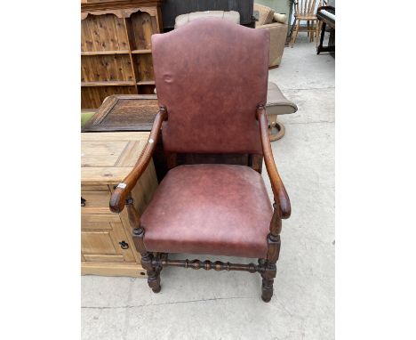AN OAK ARMCHAIR WITH BOBBIN TURNED STRETCHER  RAILS 