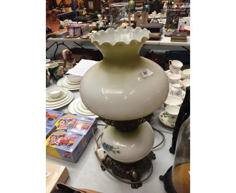 A FLORAL DESIGN OIL LAMP 58CM HIGH  CONVERTED 