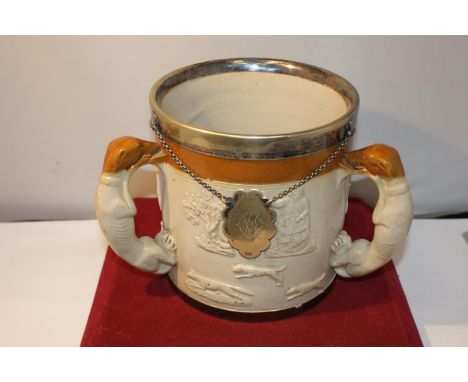 A LARGE THREE HANDLED DOULTON LAMBETH VESSEL WITH A WHITE METAL RIM, CHAIN AND LABEL 