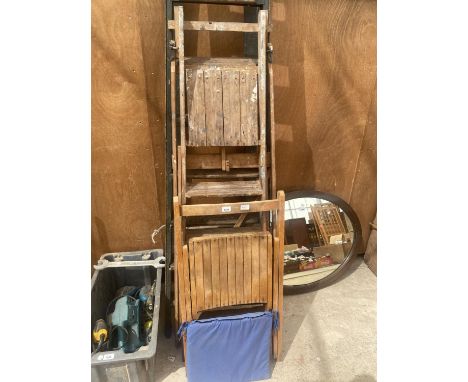 A VINTAGE 10 RUNG WOODEN STEP LADDER, A VINTAGE 4 RUNG WOODEN STEP LADDER AND A WOODEN FOLDING CHAIR 