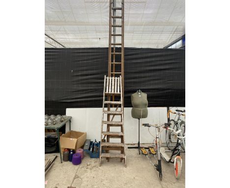 AN EXTENDABLE WOODEN LADDER AND A VINTAGE 6 RUNG WOODEN STEP LADDER 